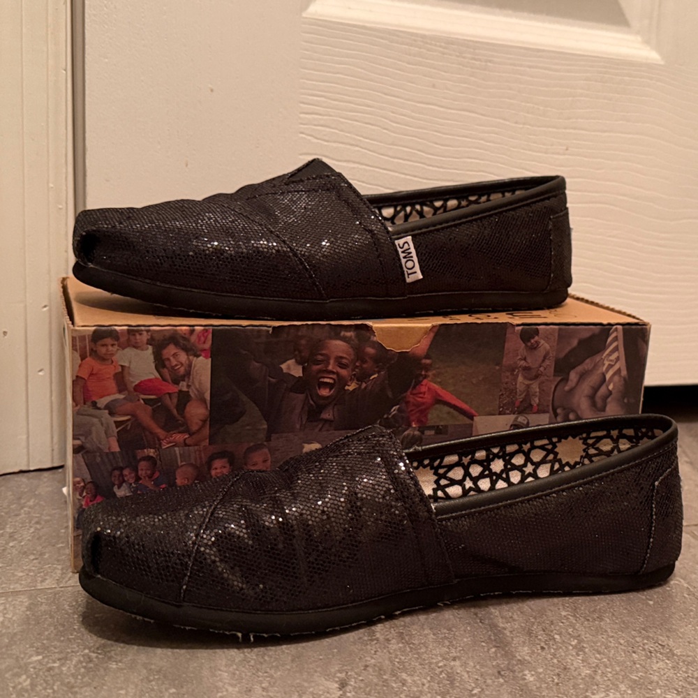TOMS Glittery Black Slip-Ons